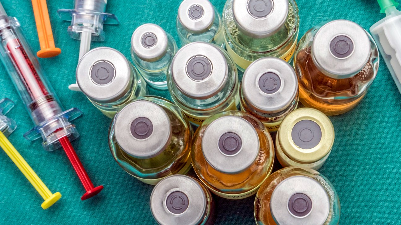 Anabolic steroid vial and syringe illustrating kidney damage risk