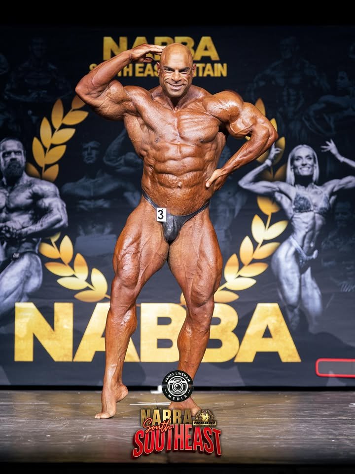 NABBA Pro Jim Georgiou on stage
