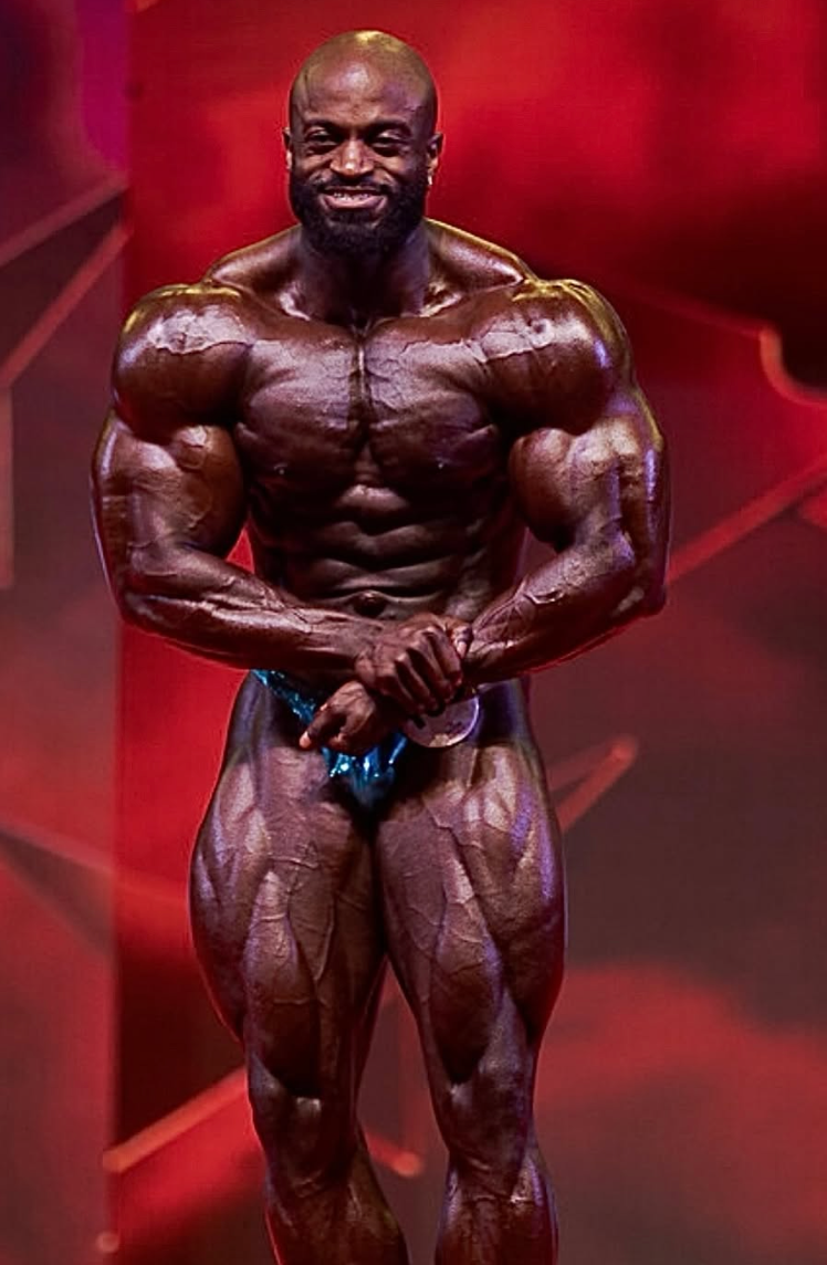 IFBB Pro Yinka on stage most muscular